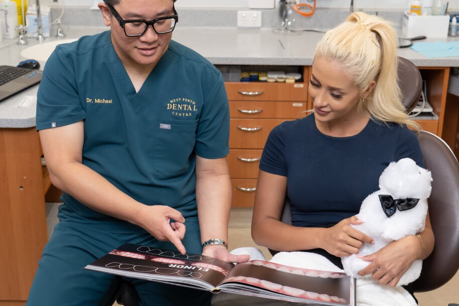 Dentist discussing treatment options with a patient